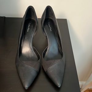 Black stiletto closed toe heels